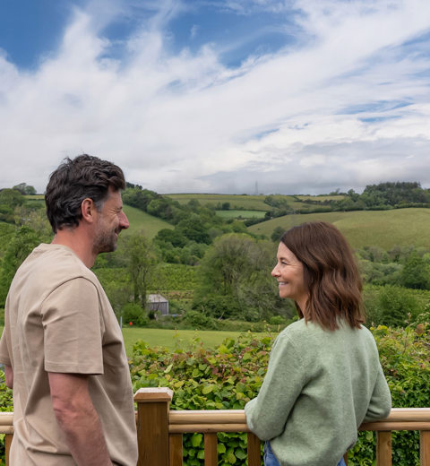 Devon Hills Meadows Development Couple Looking At The View