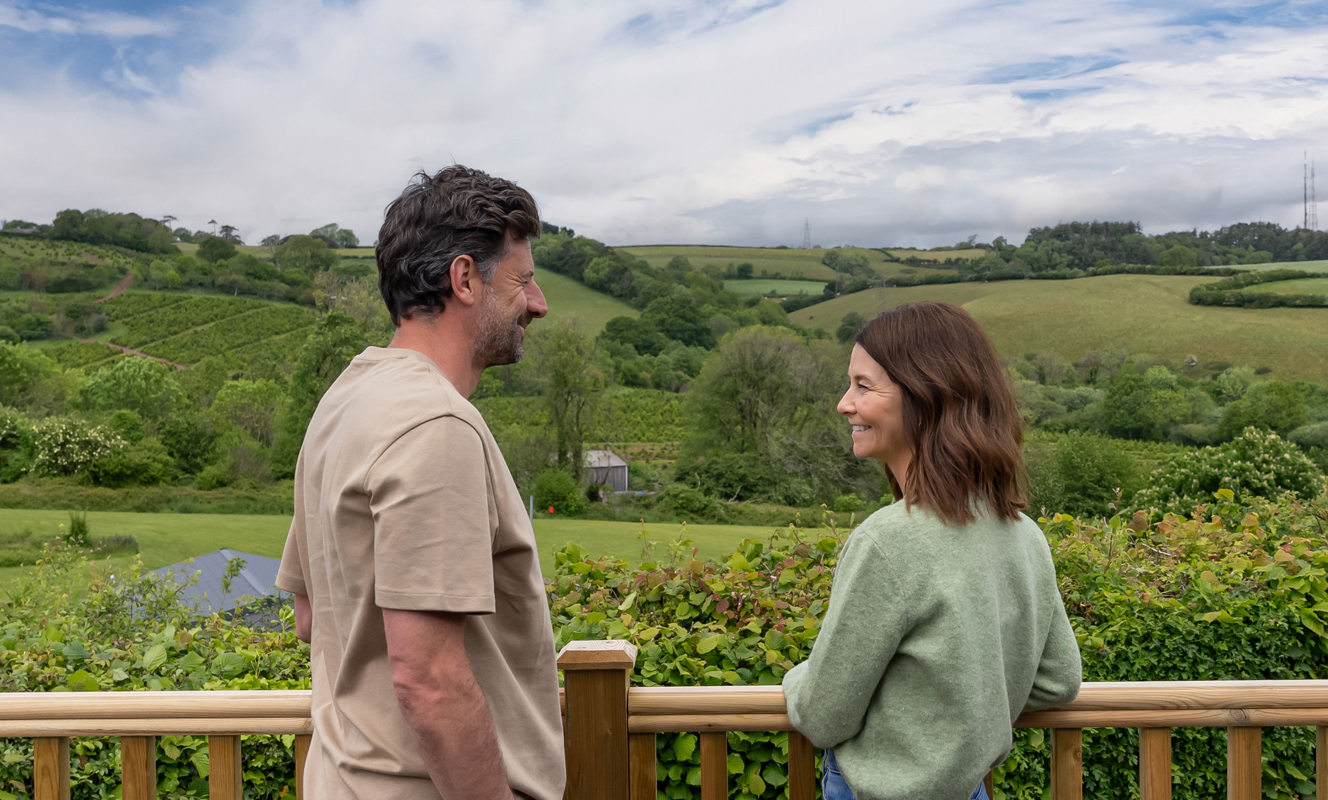 Devon Hills Meadows Development Couple Looking At The View