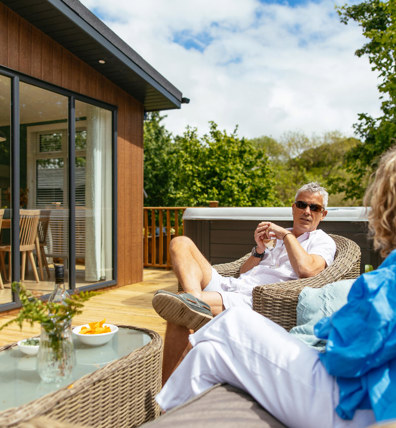Finlake Couple Sat In The Sunshine