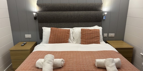 Prestige Dovecote, master bedroom at Brokerswood