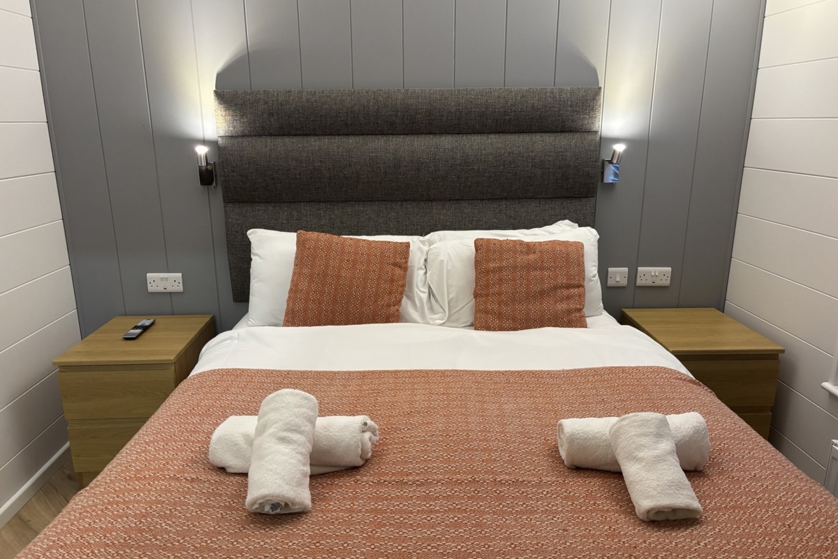 Prestige Dovecote, master bedroom at Brokerswood