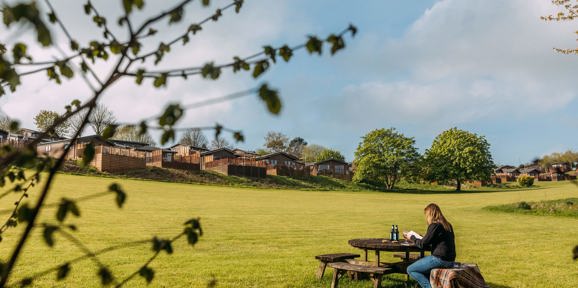 Devon Hills Overview Lady Reading On Bench