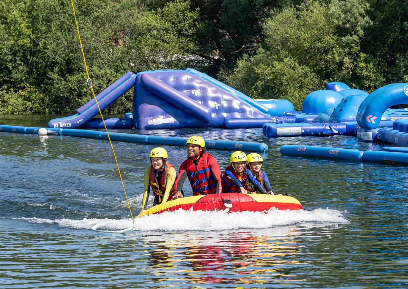 Delamere Family In Boat At Waterpark