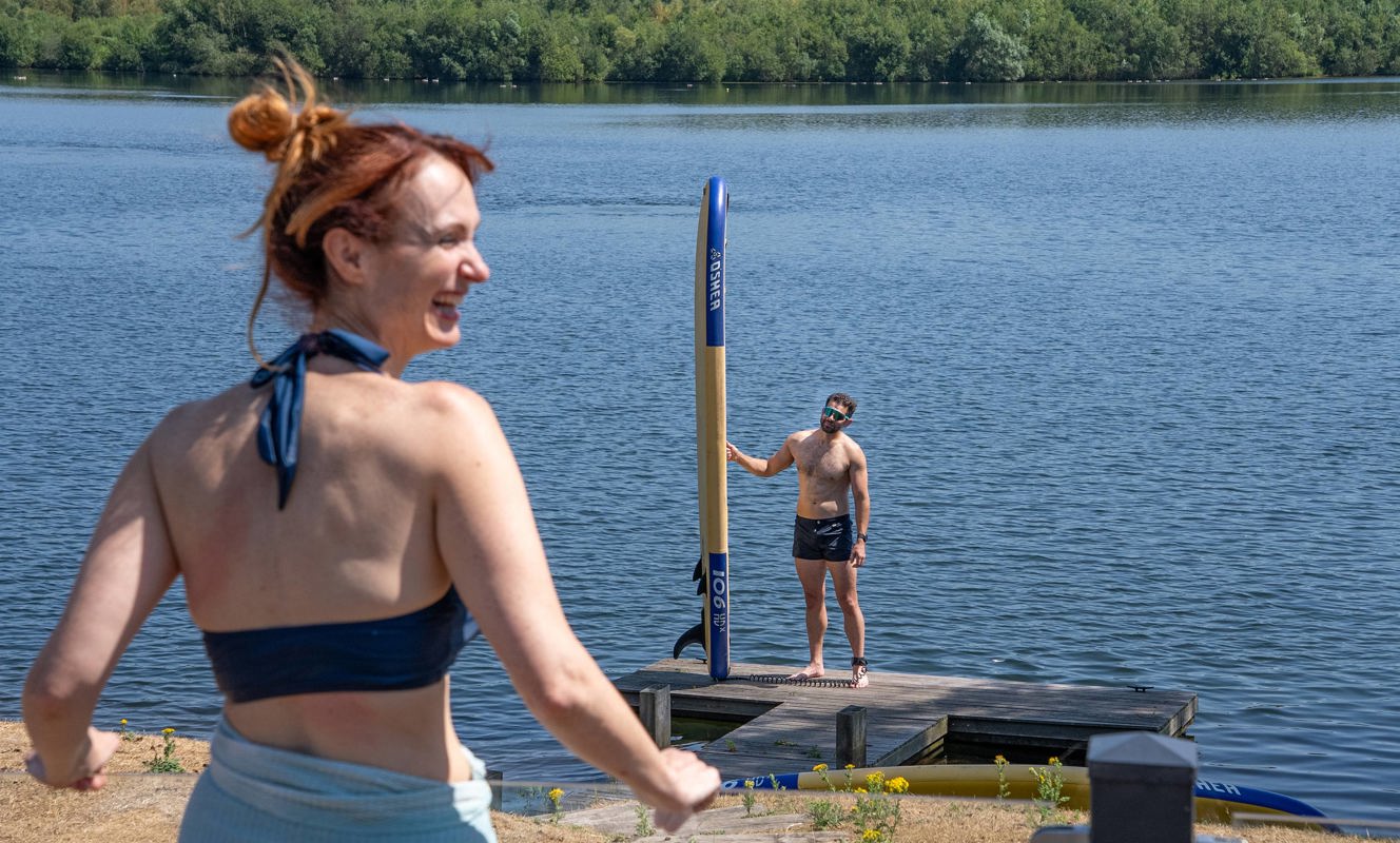 Delamere Couple By The Lake Laughing