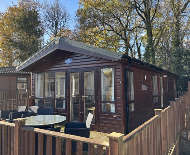 Regal Autograph, front exterior with patio furniture at Finlake