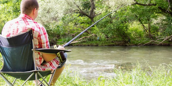 Man fishing outside