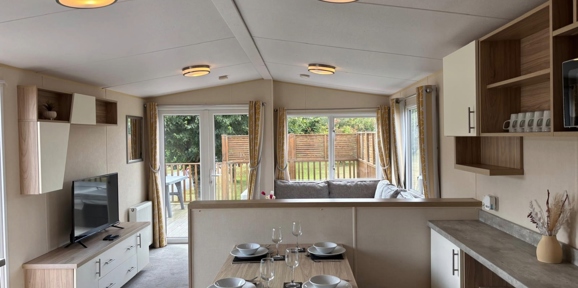 Regal Kingsbury, living room with patio doors at Dartmoor View