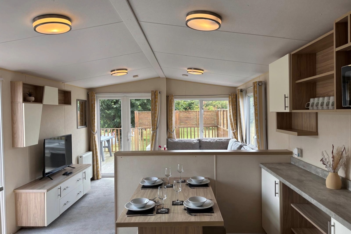 Regal Kingsbury, living room with patio doors at Dartmoor View