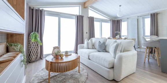 Wessex Contemporary living room with patio doors at The Warren