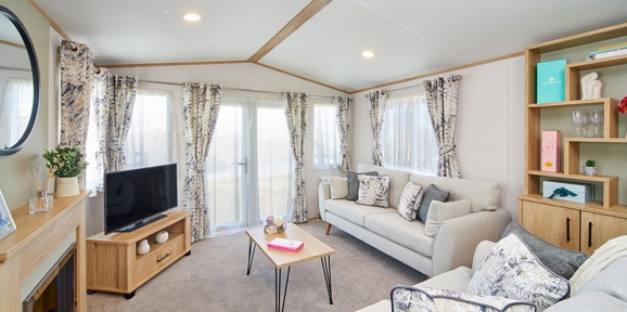 Carnaby Silverdale, lounge with patio windows at Finlake