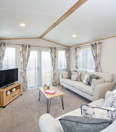 Carnaby Silverdale, lounge with patio windows at Finlake