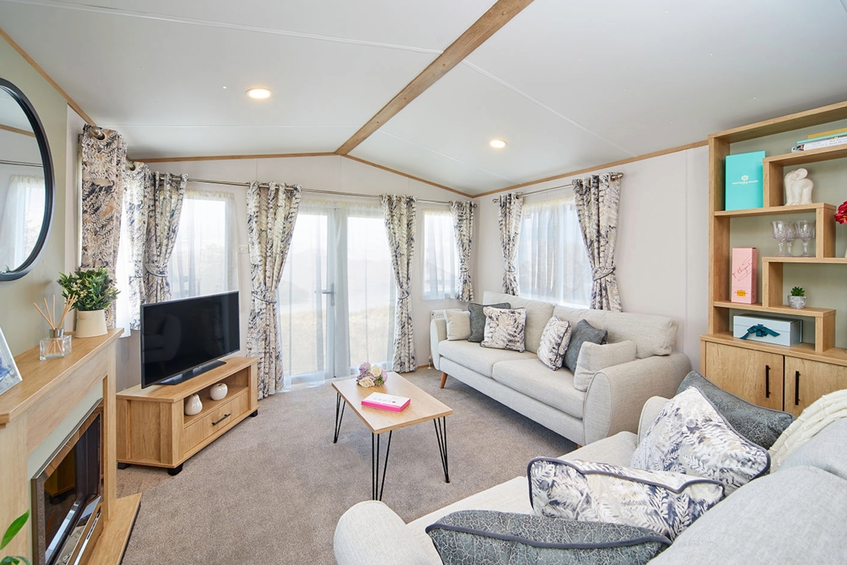 Carnaby Silverdale, lounge with patio windows at Finlake