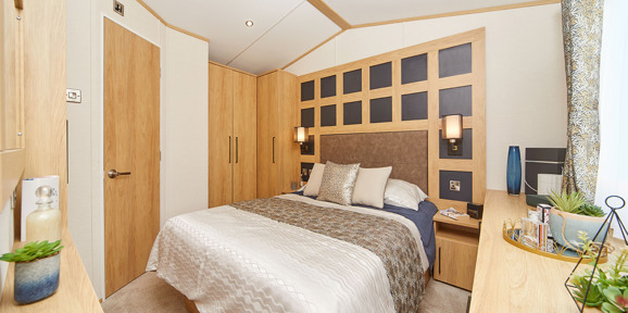 Carnaby Chantry, master bedroom with door at Talyfan