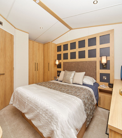 Carnaby Chantry, master bedroom with door at Talyfan