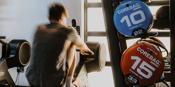 The Warren Man On The Rowing Machine In The Gym