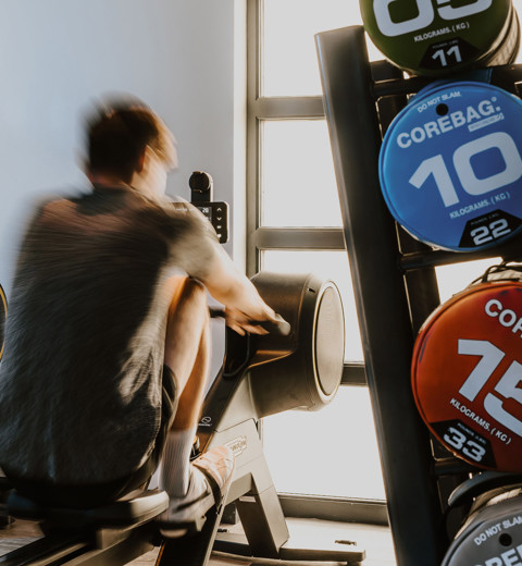 The Warren Man On The Rowing Machine In The Gym