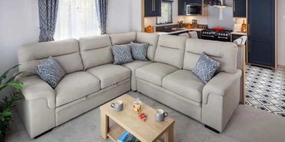 Carnaby Chantry, corner sofa in living room at Finlake