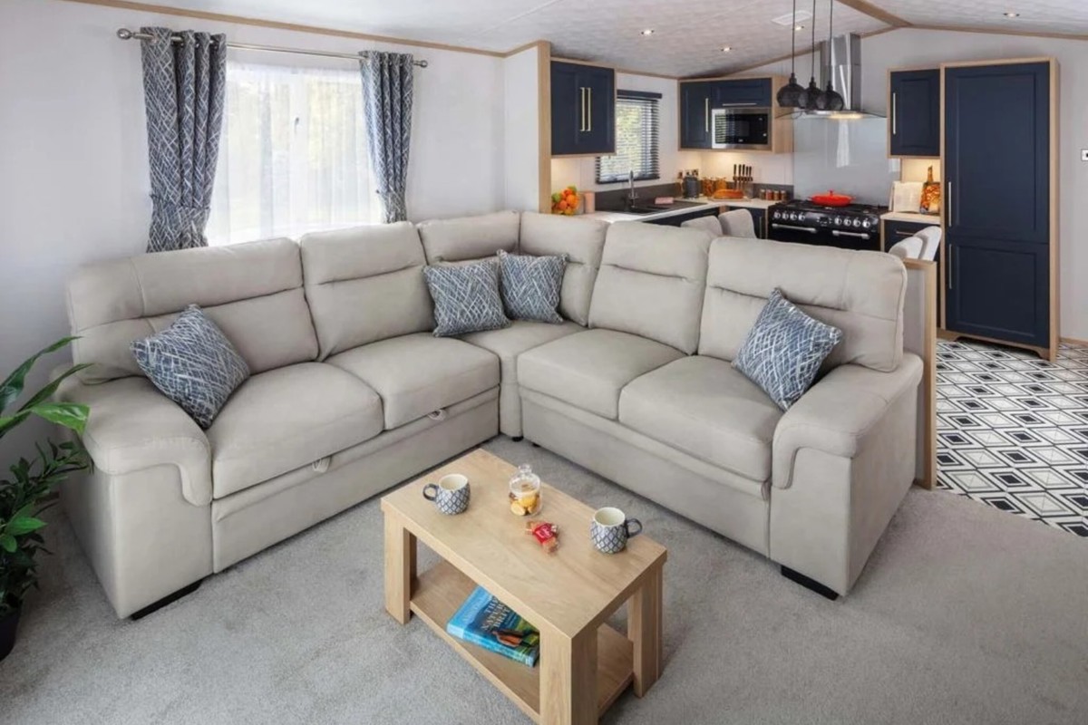 Carnaby Chantry, corner sofa in living room at Finlake