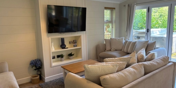 Wessex Classic, sofas and TV at Brokerswood