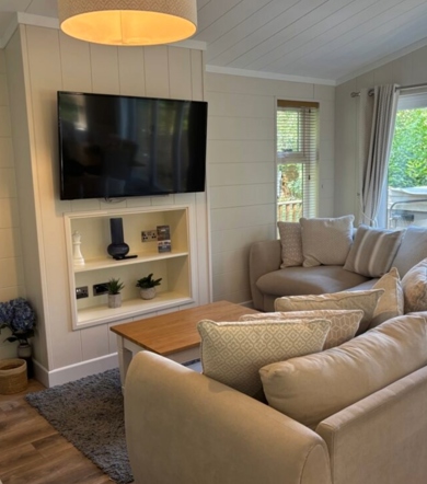 Wessex Classic, sofas and TV at Brokerswood