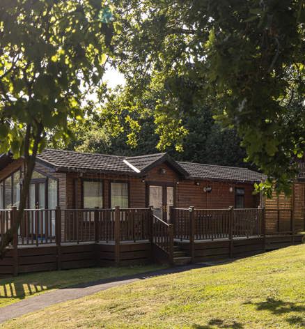 Finlake Home In Woodland Trees