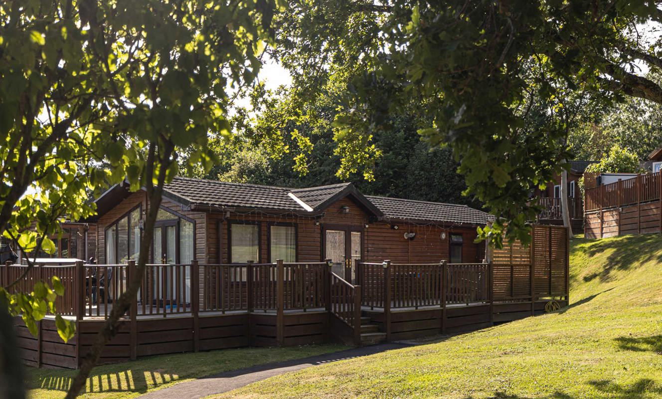 Finlake Home In Woodland Trees