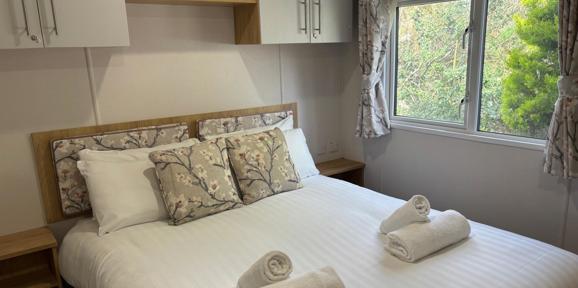 Carnaby Silverdale, master bedroom with window at Dartmoor View