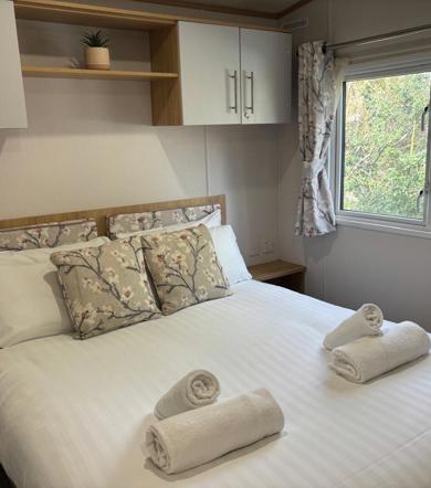 Carnaby Silverdale, master bedroom with window at Dartmoor View
