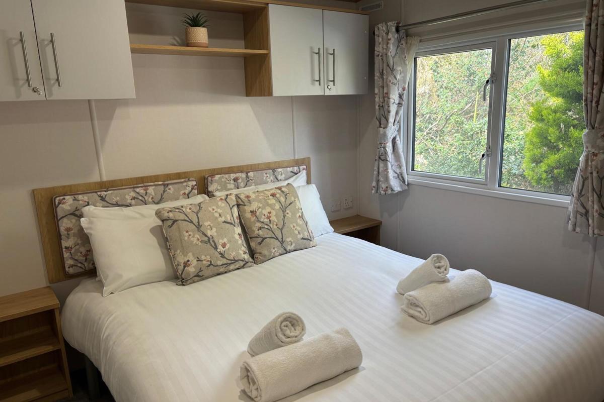 Carnaby Silverdale, master bedroom with window at Dartmoor View