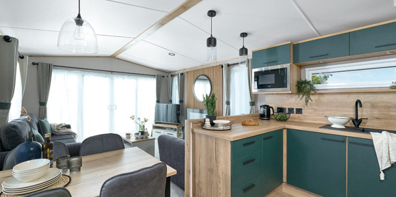 ABI St David, dining table and kitchen area at Praa Sands