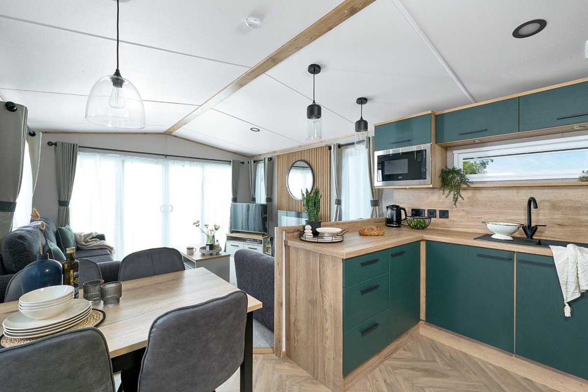 ABI St David, dining table and kitchen area at Praa Sands