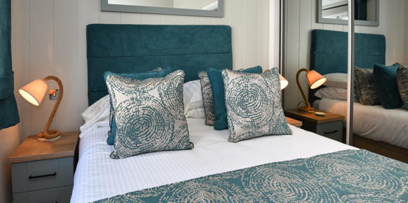 Wessex Dune, master bedroom with mirror at The Warren