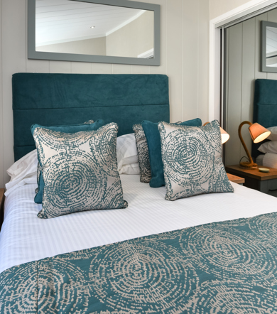 Wessex Dune, master bedroom with mirror at The Warren