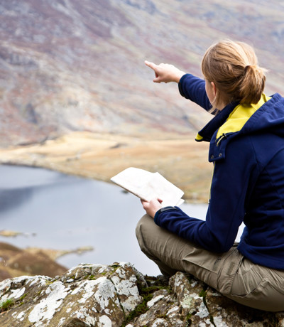 Tal Y Fan Local Area Women Hiking In Snowdonia
