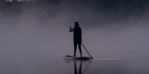 Delamere Overview Lone Paddleboarder