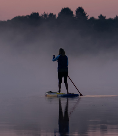 Delamere Overview Lone Paddleboarder