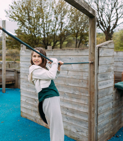 Devon Hills Overview Child On Playground