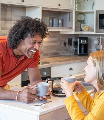 Delamere Couple Talking In Kitchen