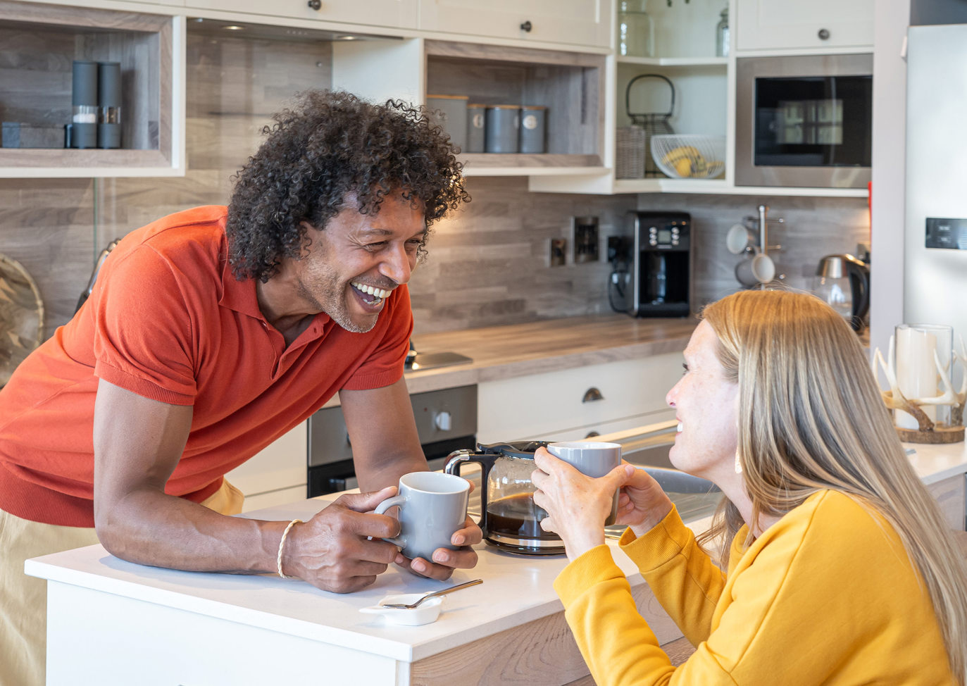 Delamere Couple Talking In Kitchen