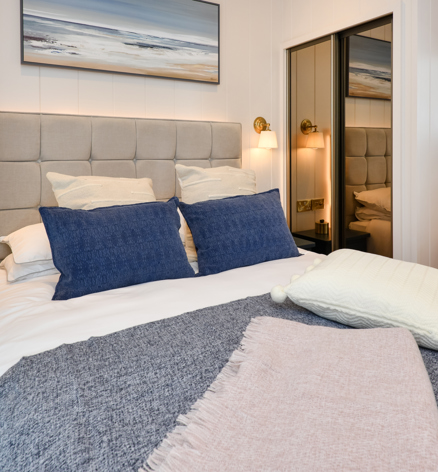 Retreat Coastal, master bedroom at The Warren