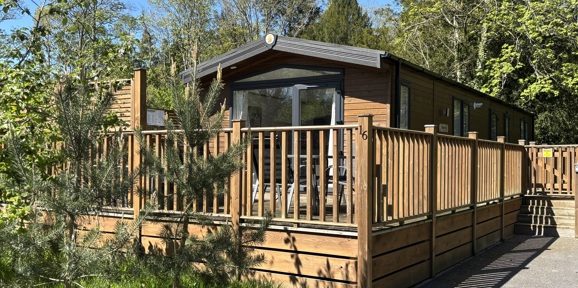 Sunseeker Supreme, external with trees at Brokerswood