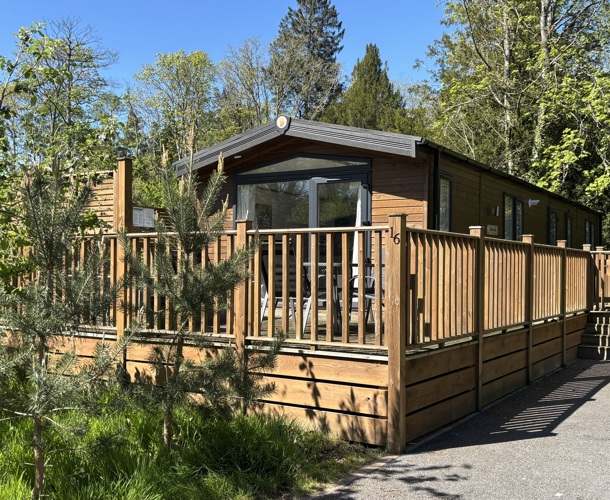 Sunseeker Supreme, external with trees at Brokerswood