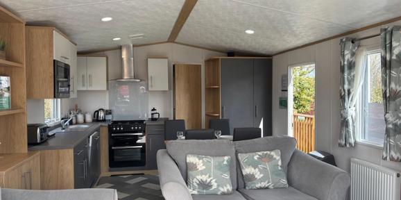 Carnaby Silverdale, sofa and kitchen at Dartmoor View