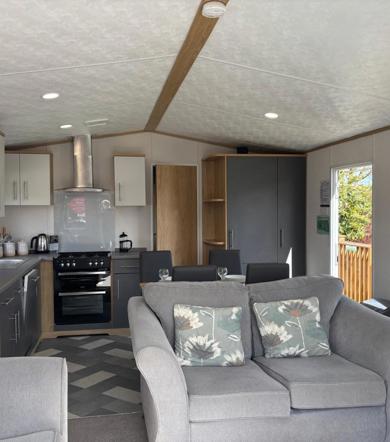 Carnaby Silverdale, sofa and kitchen at Dartmoor View