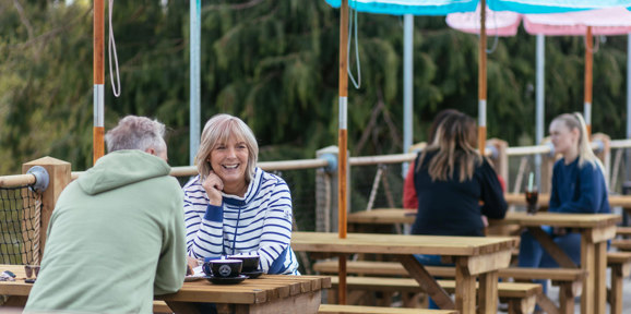 Devon Hills Couple Sat Outside At The Hive