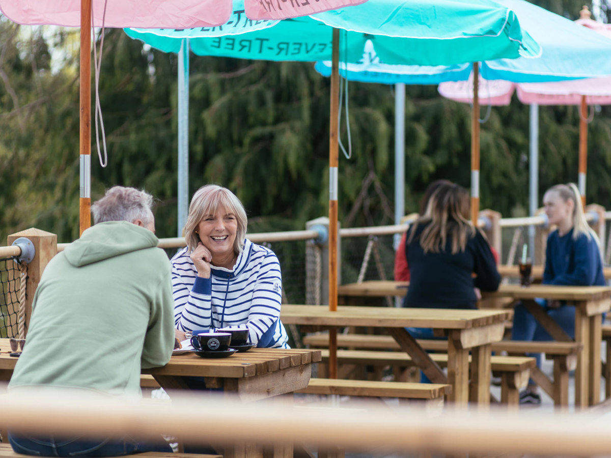 Devon Hills Couple Sat Outside At The Hive