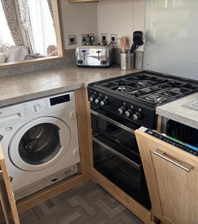 Carnaby Glenmoor Lodge, washing machine at Dartmoor View
