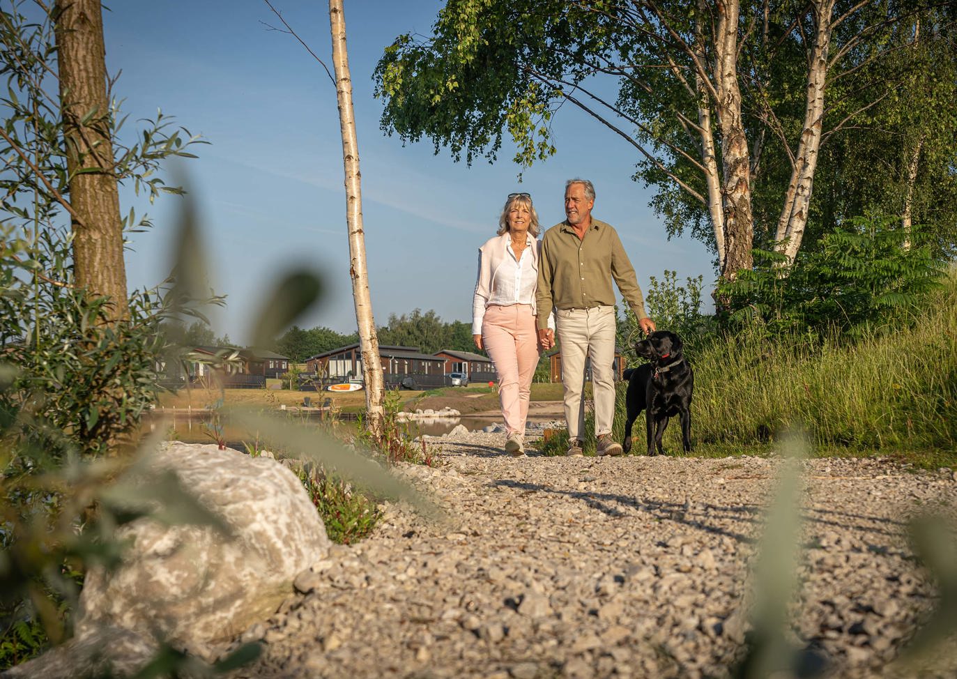 Delamere Couple Taking A Stroll With Dog