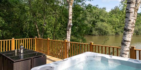 Brokerswood Hot Tub On The Decking With Lake View