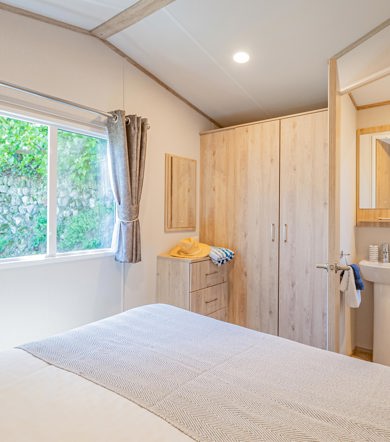 Carnaby Ashdale, master bedroom with window at Praa Sands